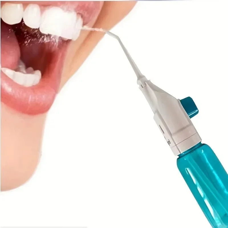 183---Portable high-pressure oral irrigator - manual tooth cleaner with grip, nozzle attachment for gum health