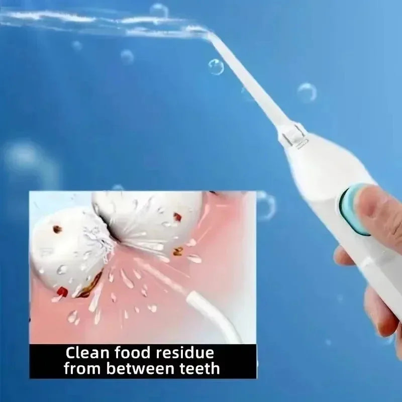 183---Portable high-pressure oral irrigator - manual tooth cleaner with grip, nozzle attachment for gum health